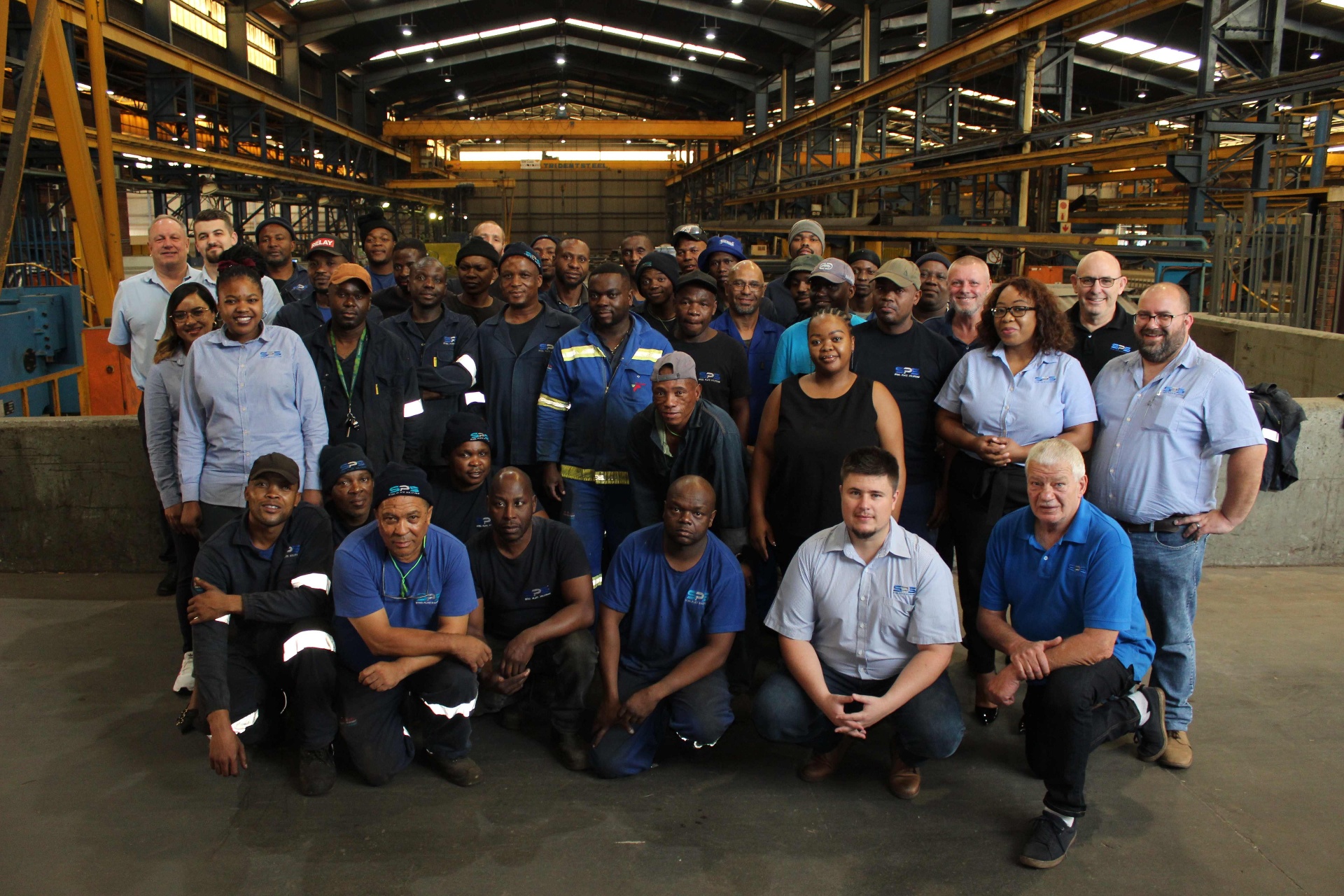 The SPS Germiston team on the workshop floor