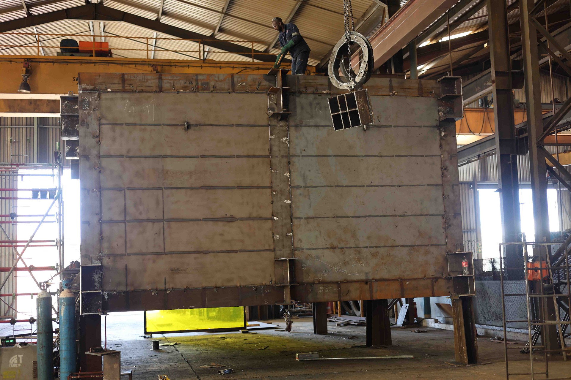 Pontoon hull section under assembly with overhead crane at SPS