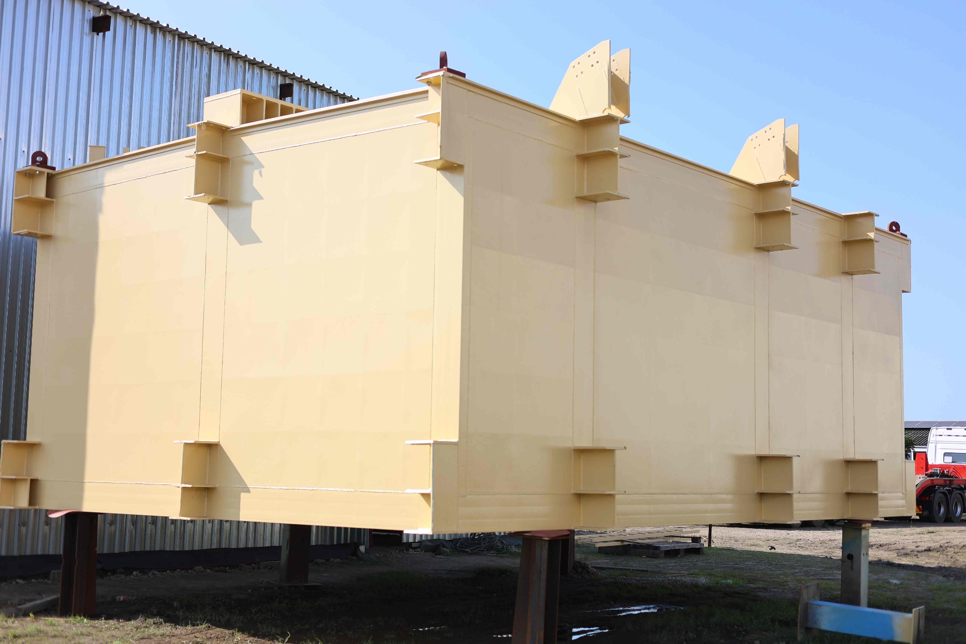 Completed pontoon in finished yellow coating, end view