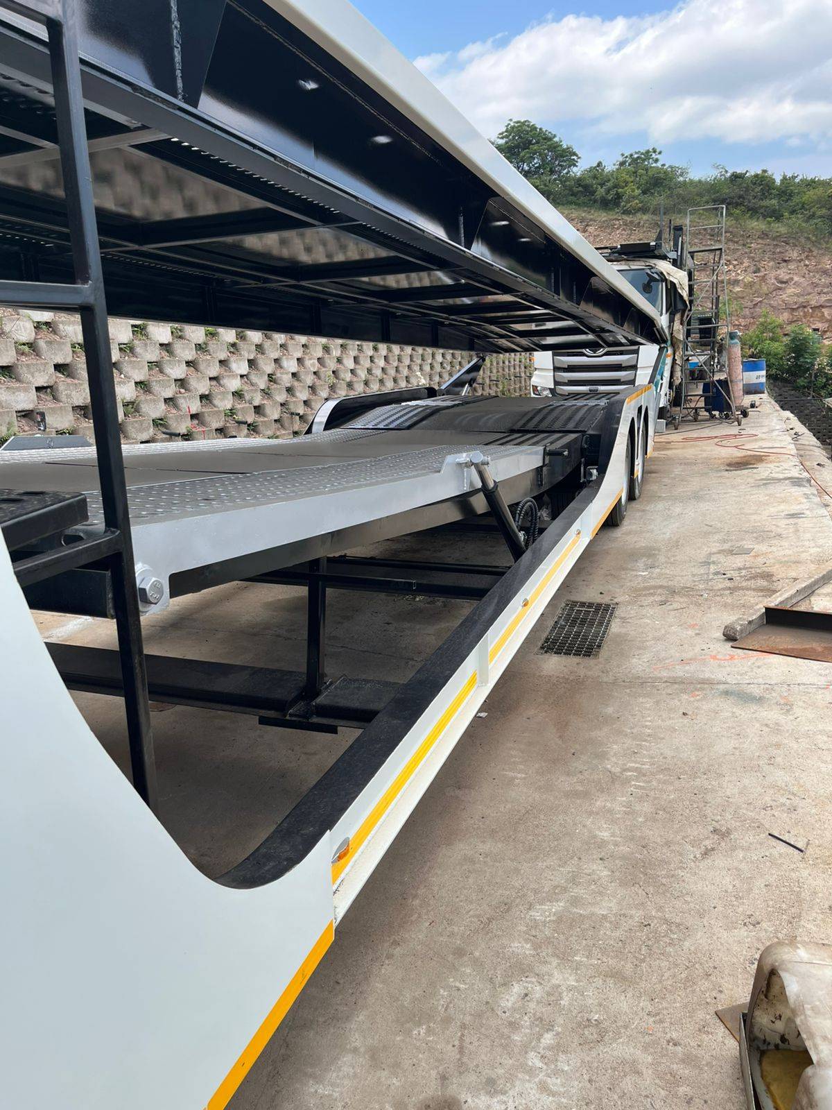 Lower deck and ramp detail of the finished car carrier trailer
