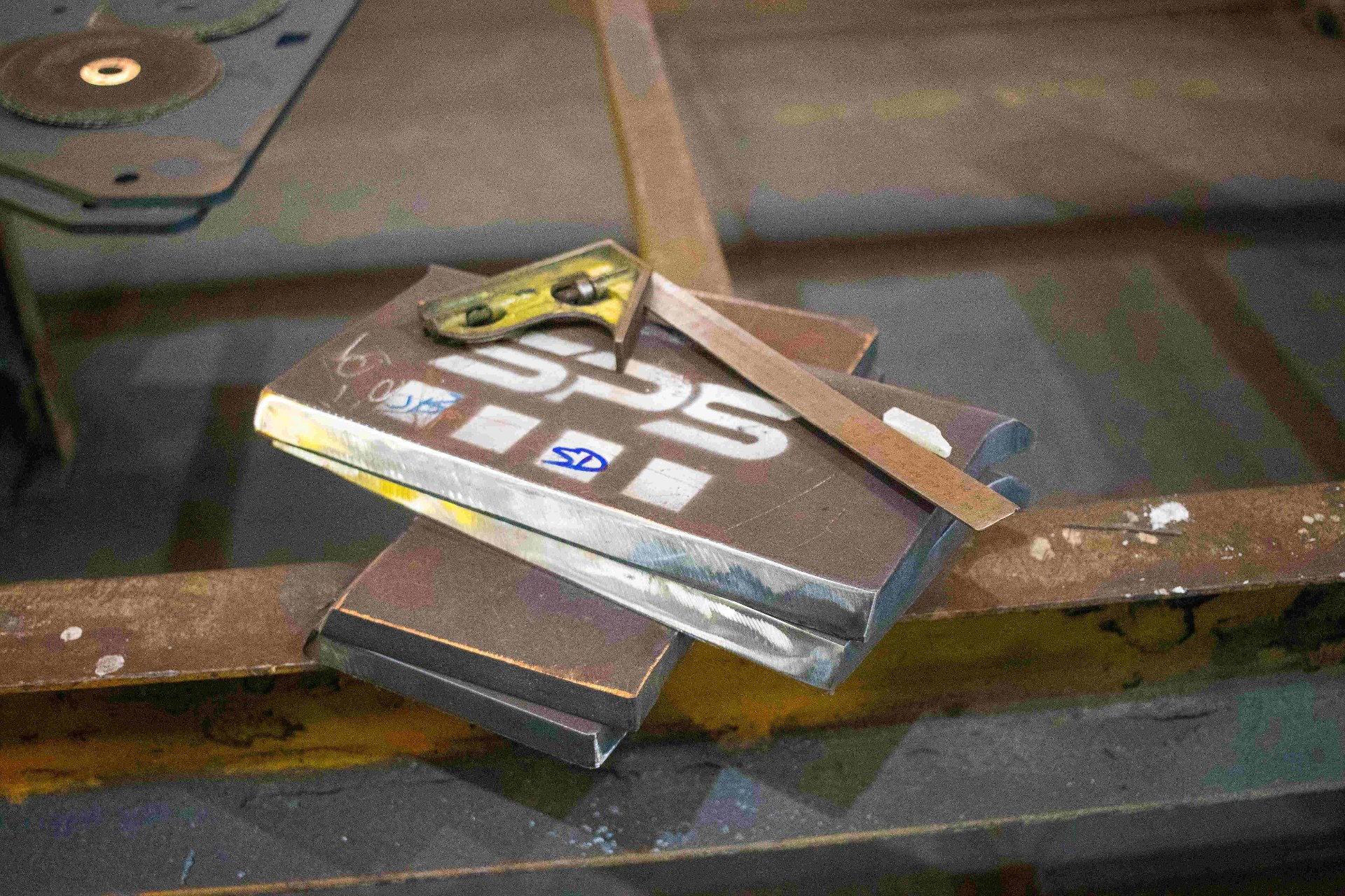 SPS branded steel plate with quality control sign-off blocks